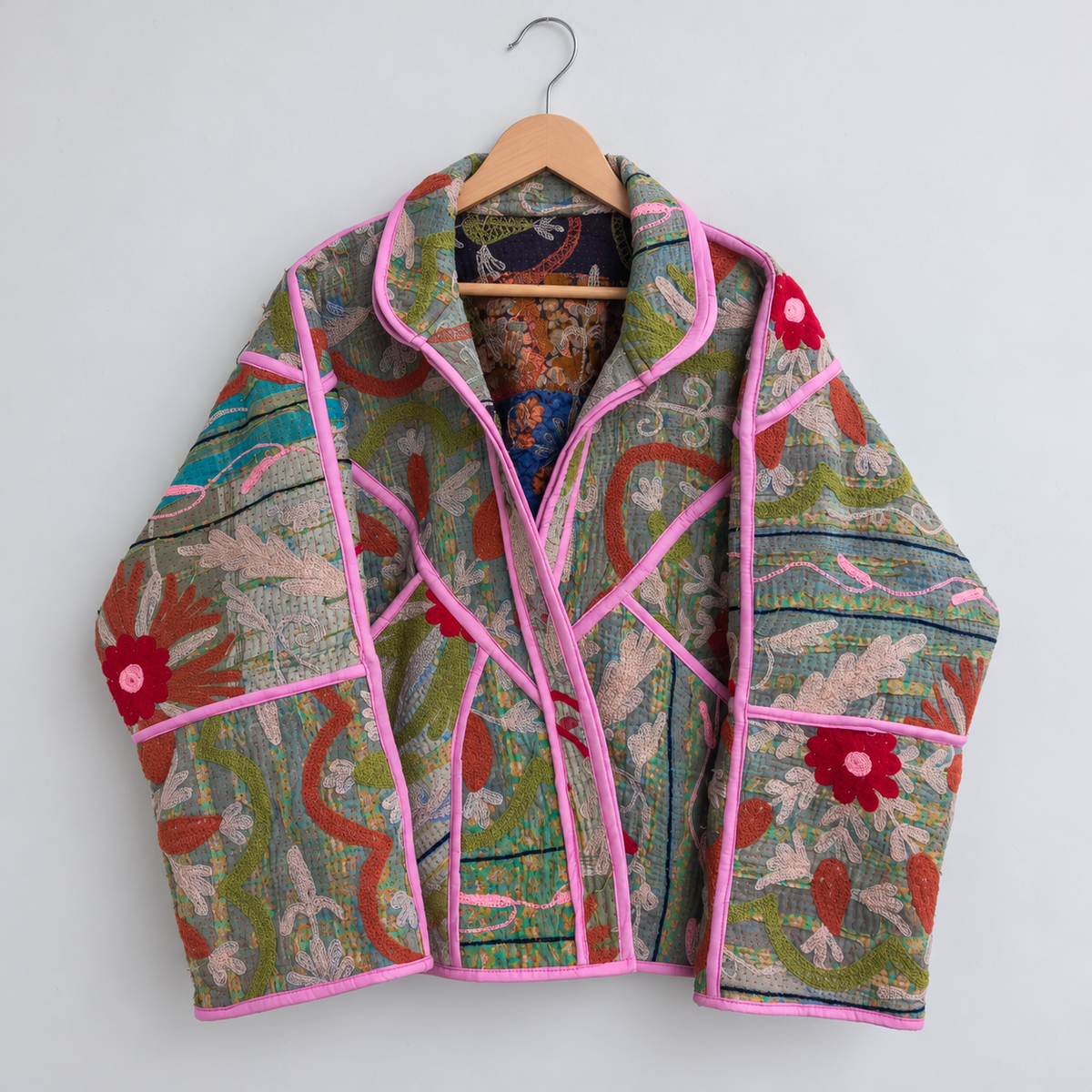 Sage green Kantha jacket with red flower embroidery and pink piping