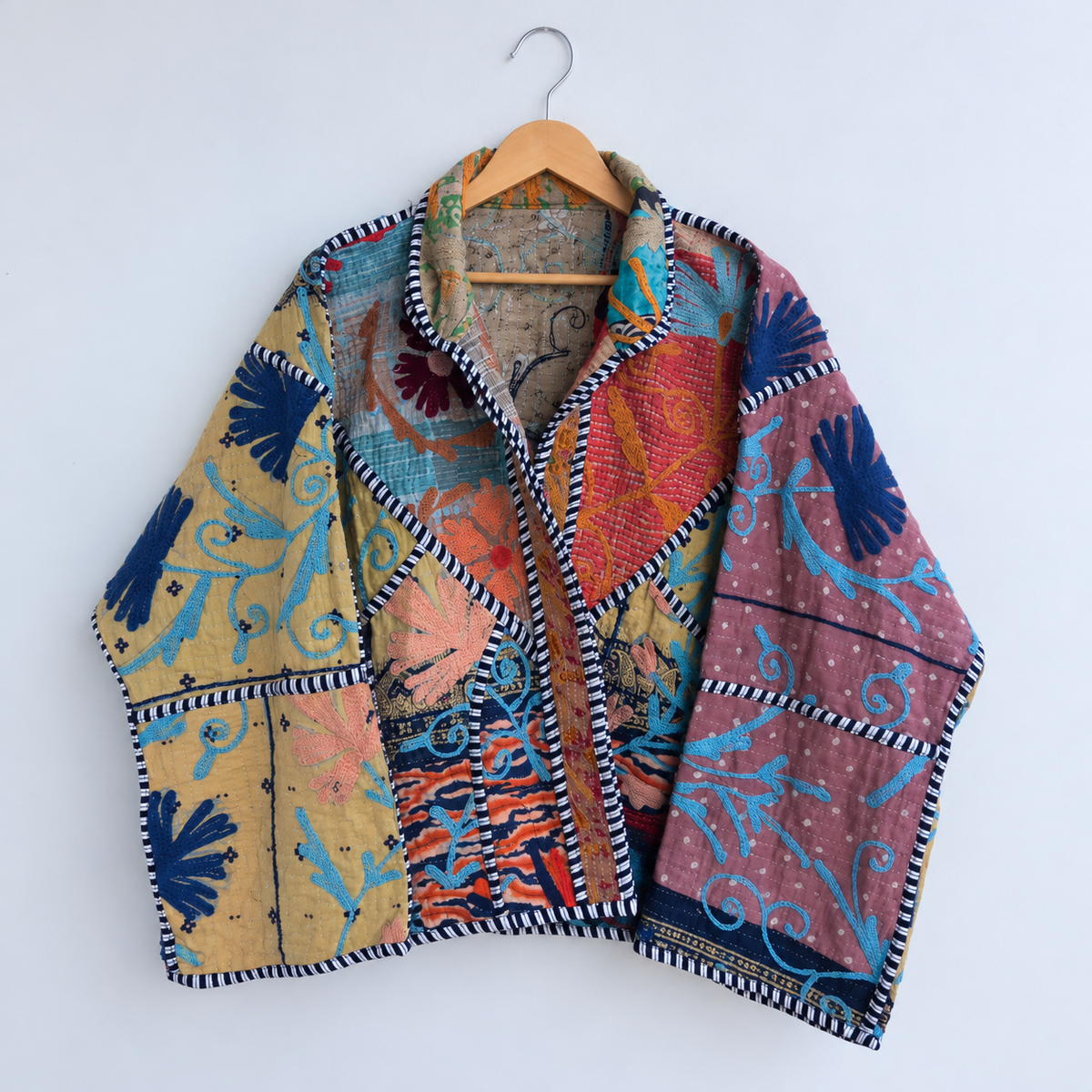 Multicolour patchwork Kantha jacket with blue embroidery and striped piping